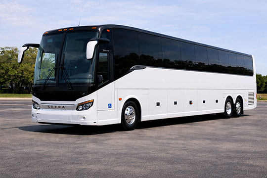 56-passenger charter bus rental Merced TX